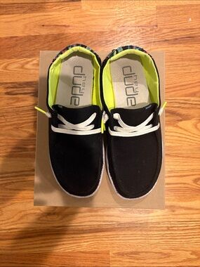 Hey Dude women’s Black Canvas Sneakers with Neon Yellow Interior